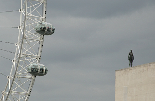 London Eye and Antony Gormley statue