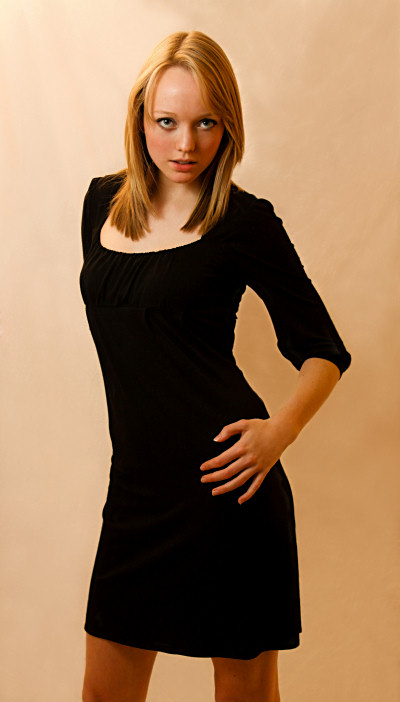 Girl posing in black dress